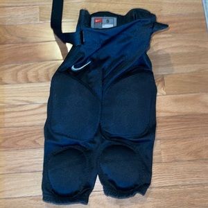 - Youth size small football pads with belt. Excellent condition